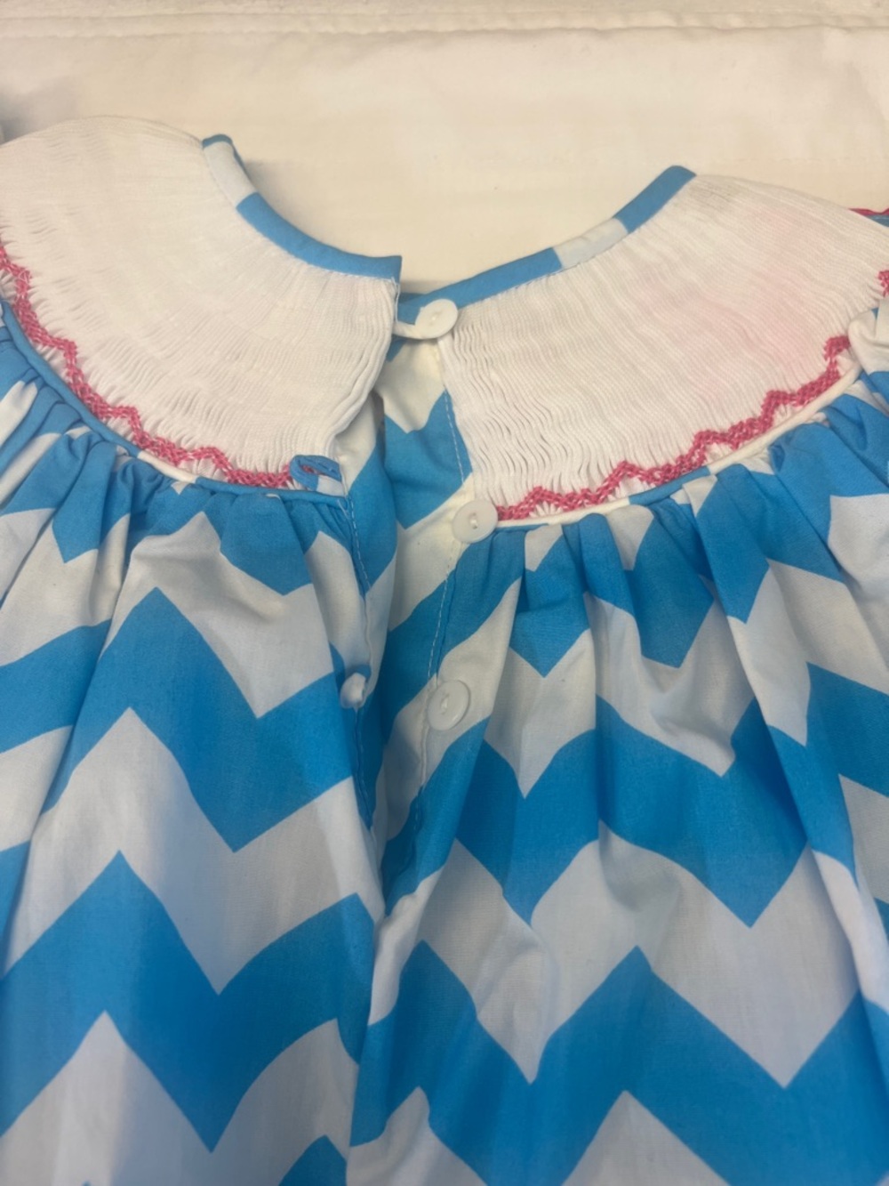 Blue Chevron Smocked Girls Dress with Pink Polka Dot Trim - Picture 7 of 7